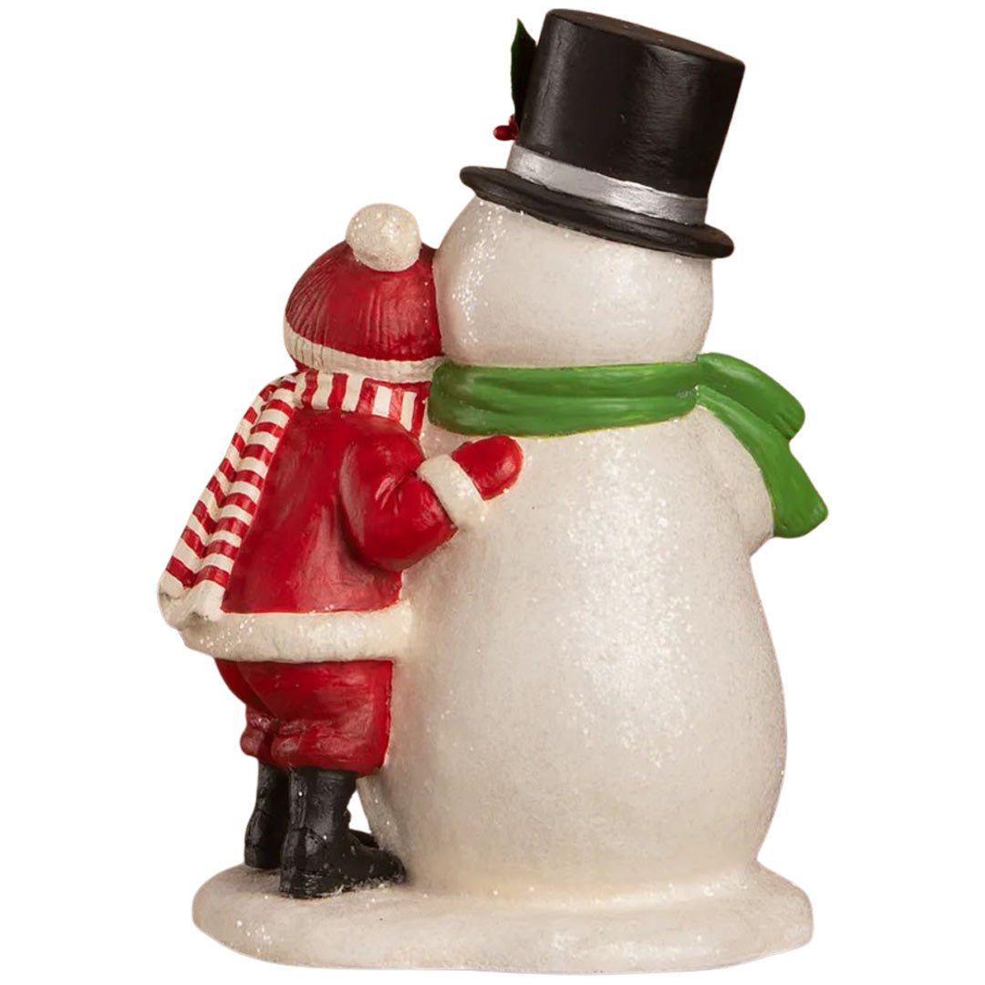 Bethany Lowe Child Hugging Snowman back