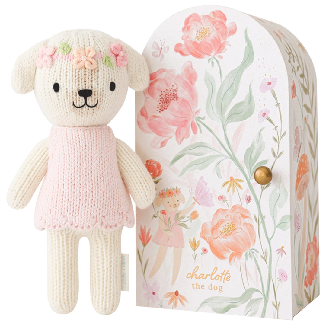 cuddle kind Tiny Charlotte the Dog