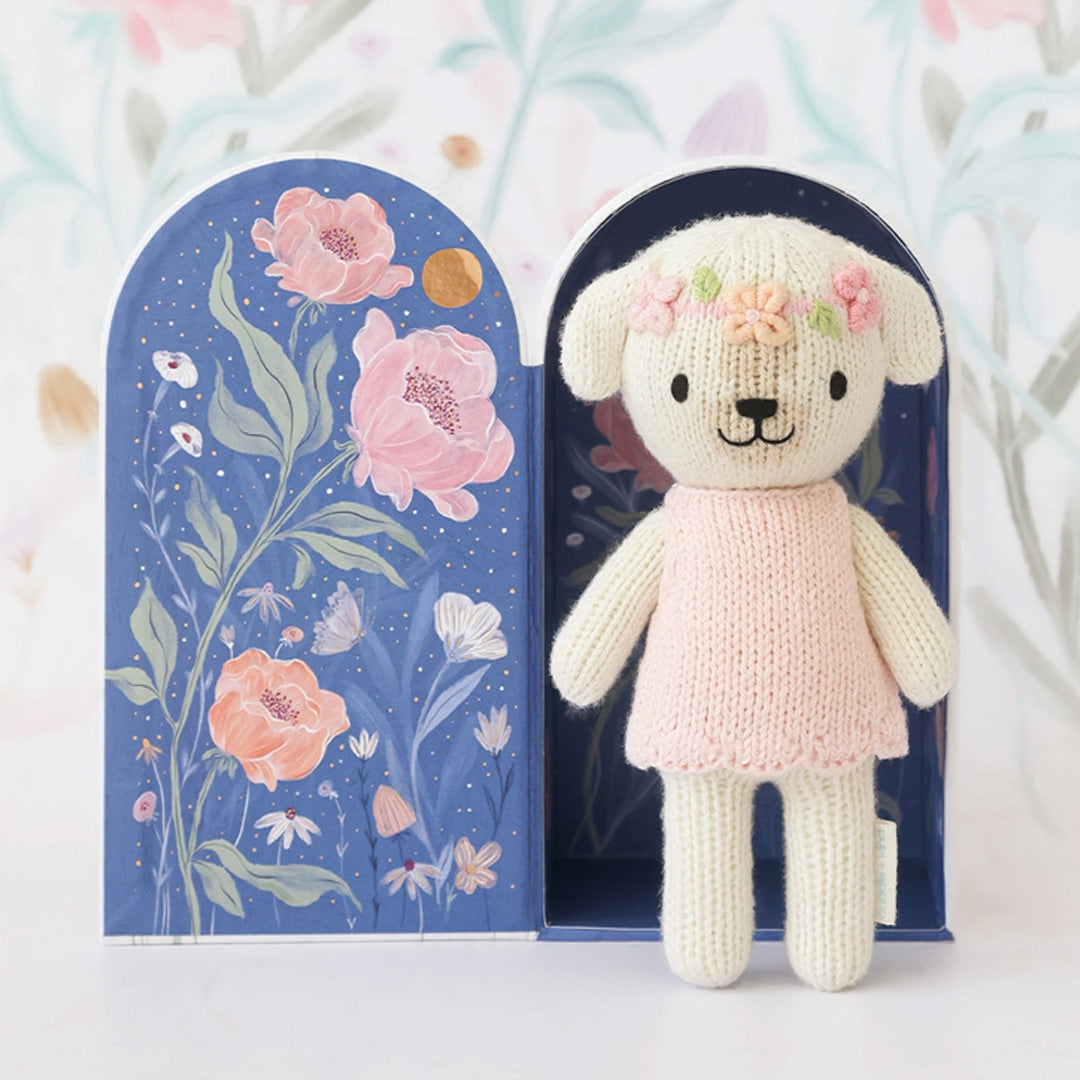 cuddle kind Tiny Charlotte the Dog