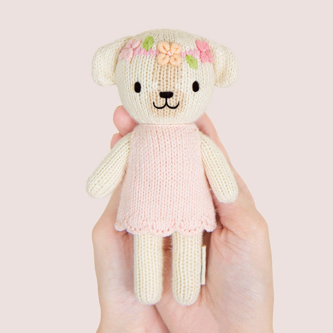 cuddle kind Tiny Charlotte the Dog