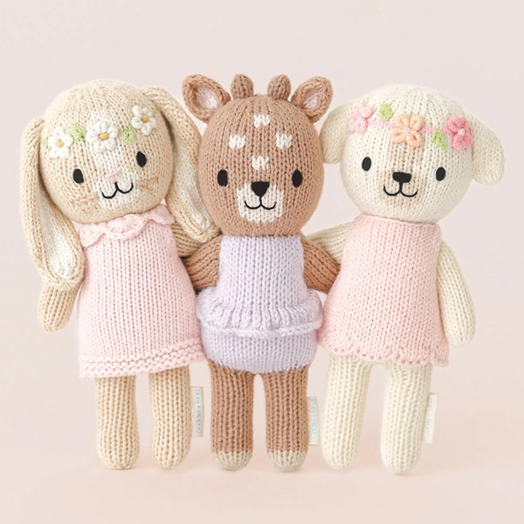 cuddle kind Tiny Charlotte the Dog