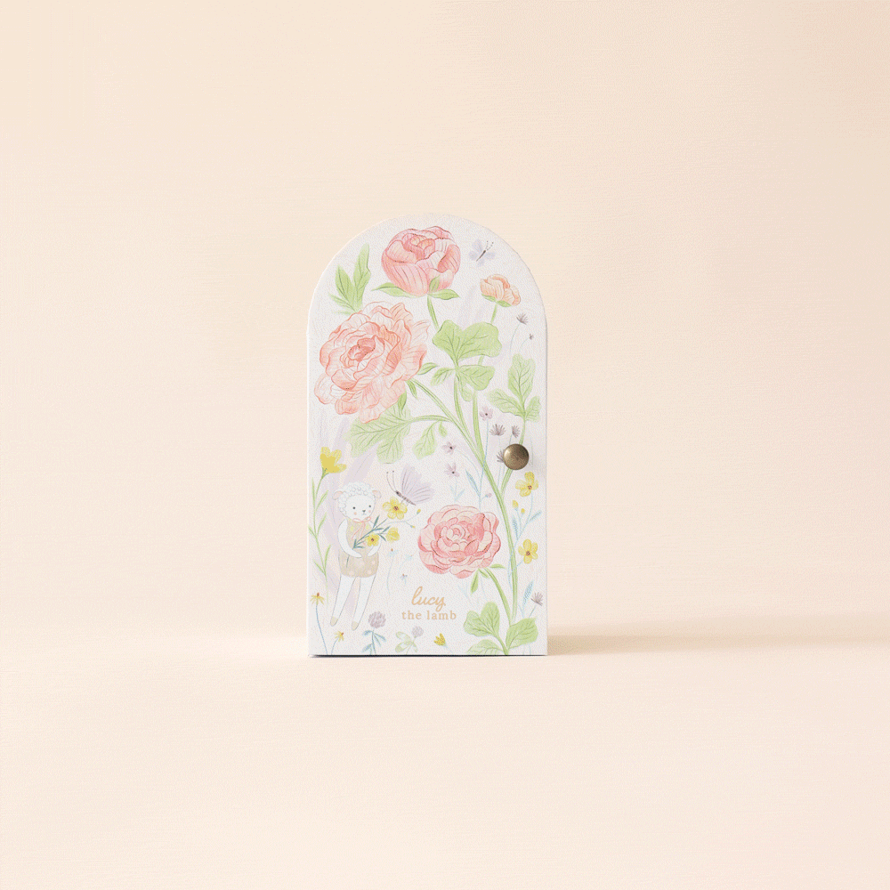 cuddle kind Tiny Lucy the Lamb