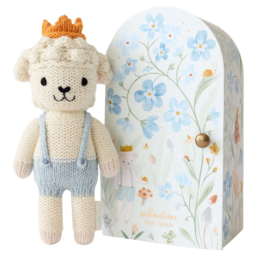 cuddle kind Tiny Sebastian the Lamb
