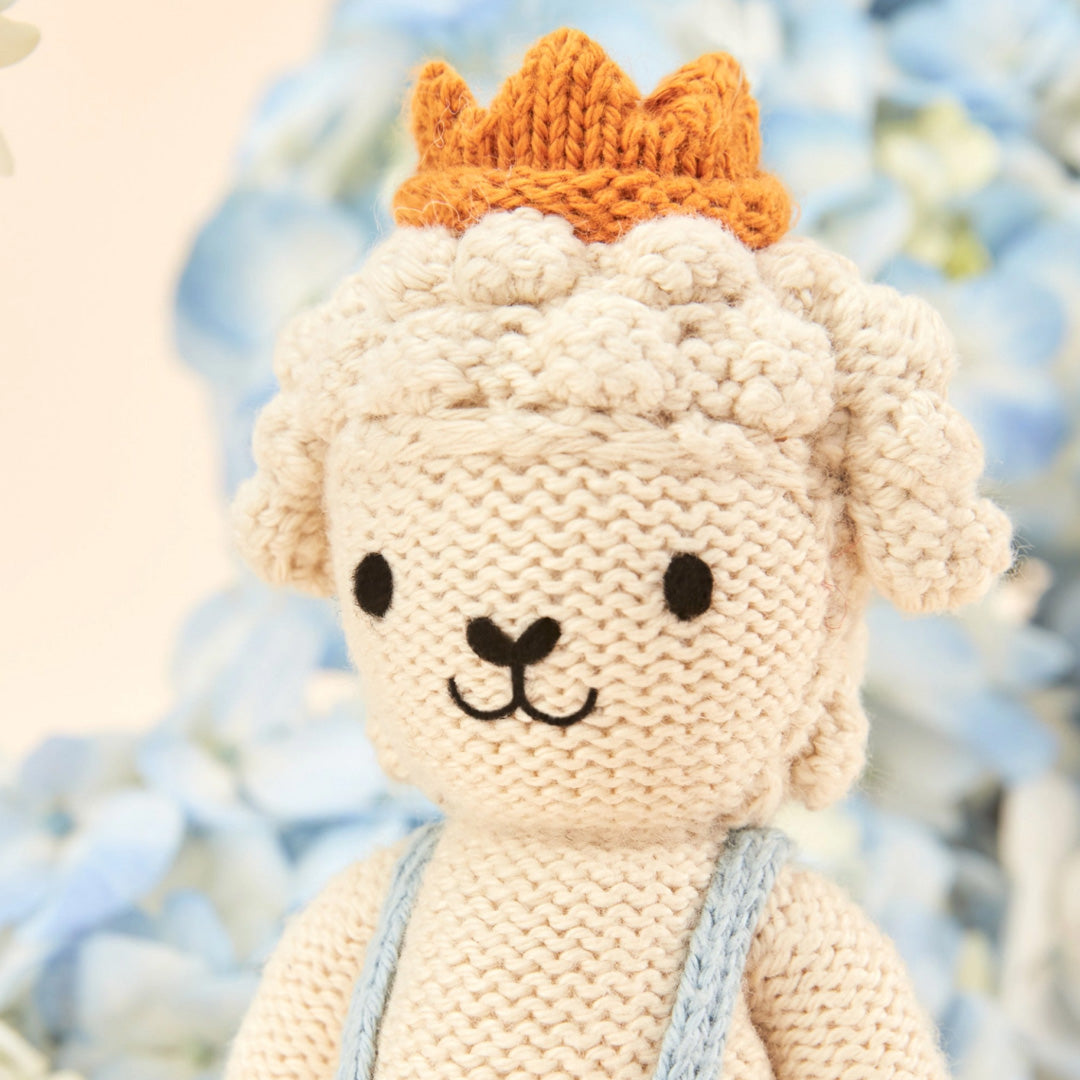 cuddle kind Tiny Sebastian the Lamb