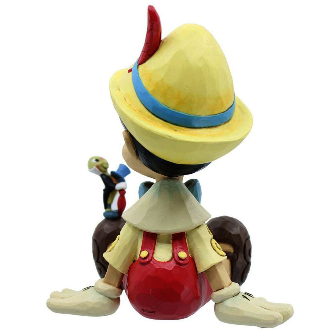 Jim Shore Pinocchio and Jiminy Sitting back
