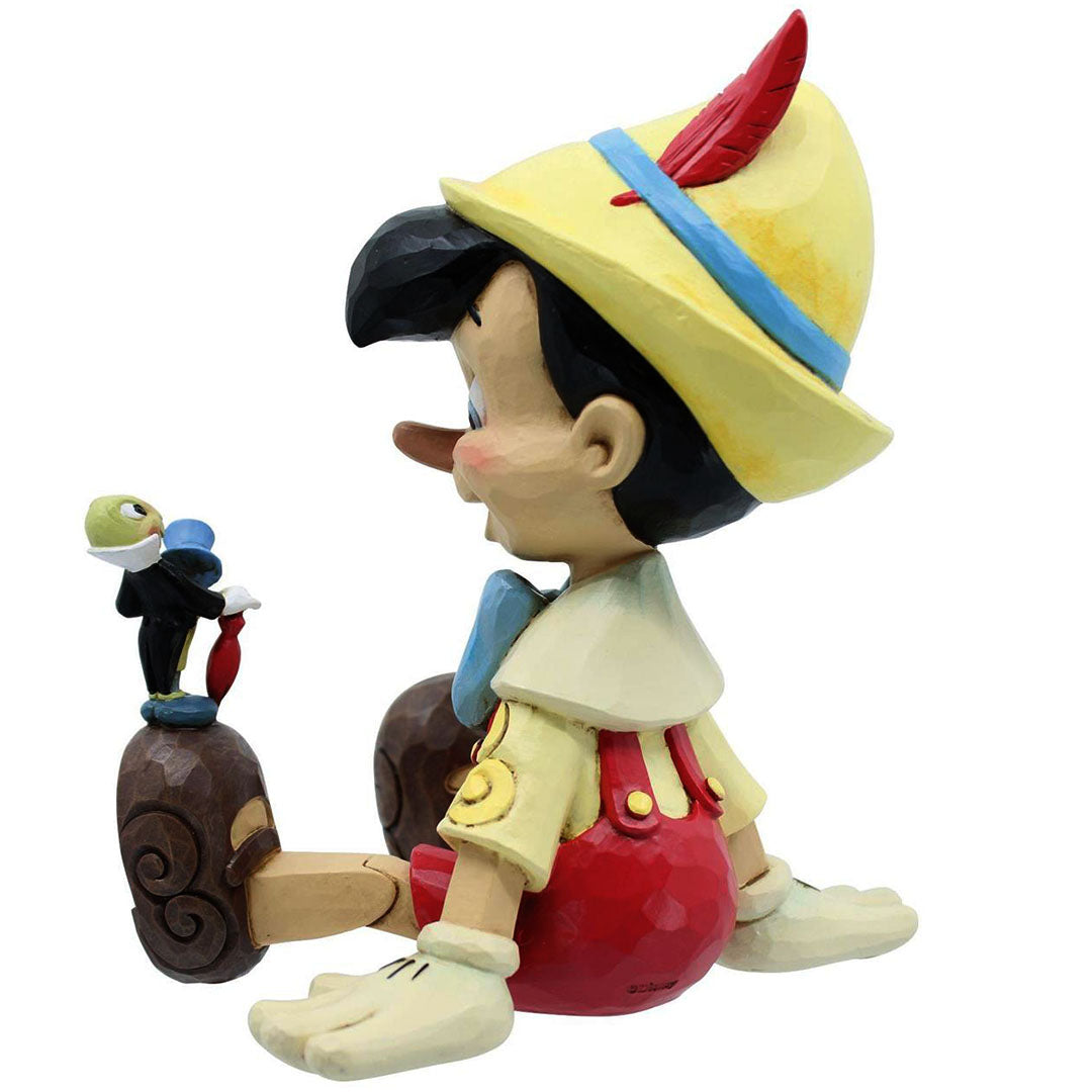 Jim Shore Pinocchio and Jiminy Sitting back
