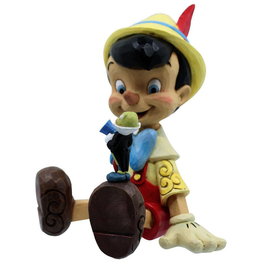 Jim Shore Pinocchio and Jiminy Sitting side