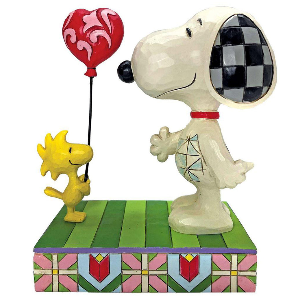 Jim Shore Woodstock giving Snoopy Heart