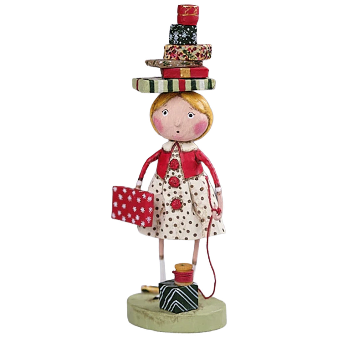 Wrappings and Ribbons Christmas Figurine Collectible by Lori Mitchell front