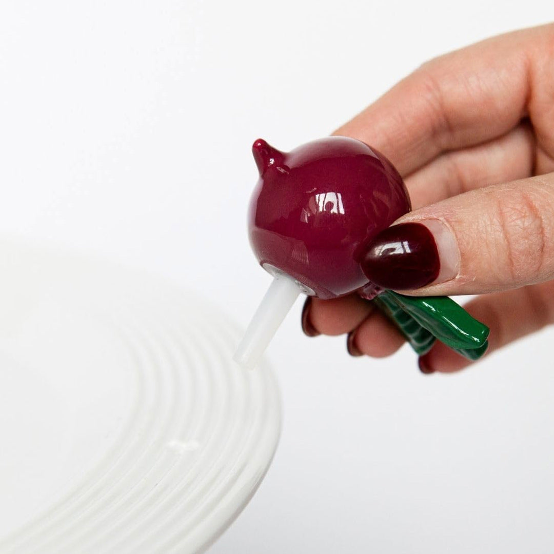 Nora Fleming totally rad (radish) close up