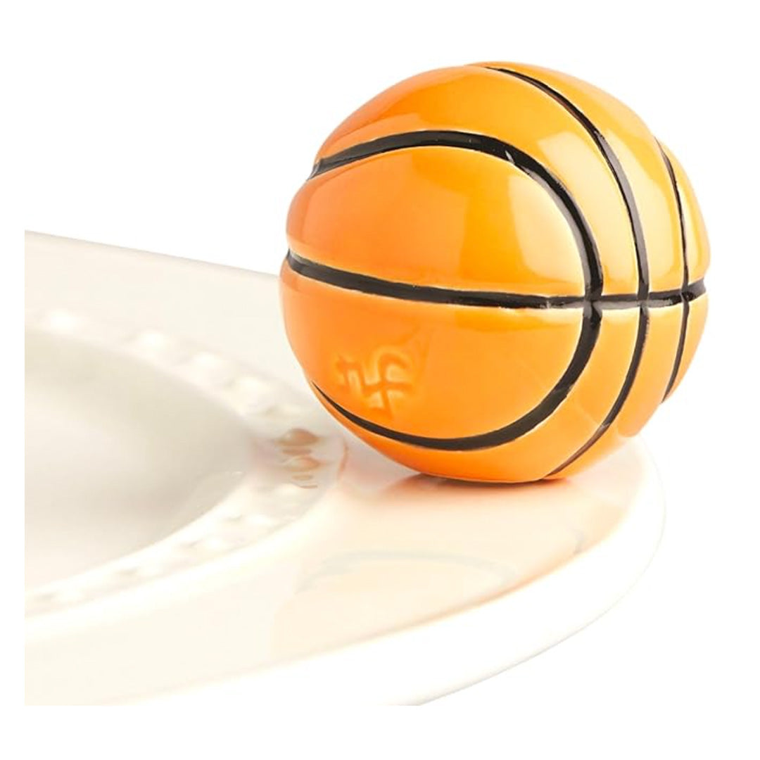 nora fleming basketball on the plate