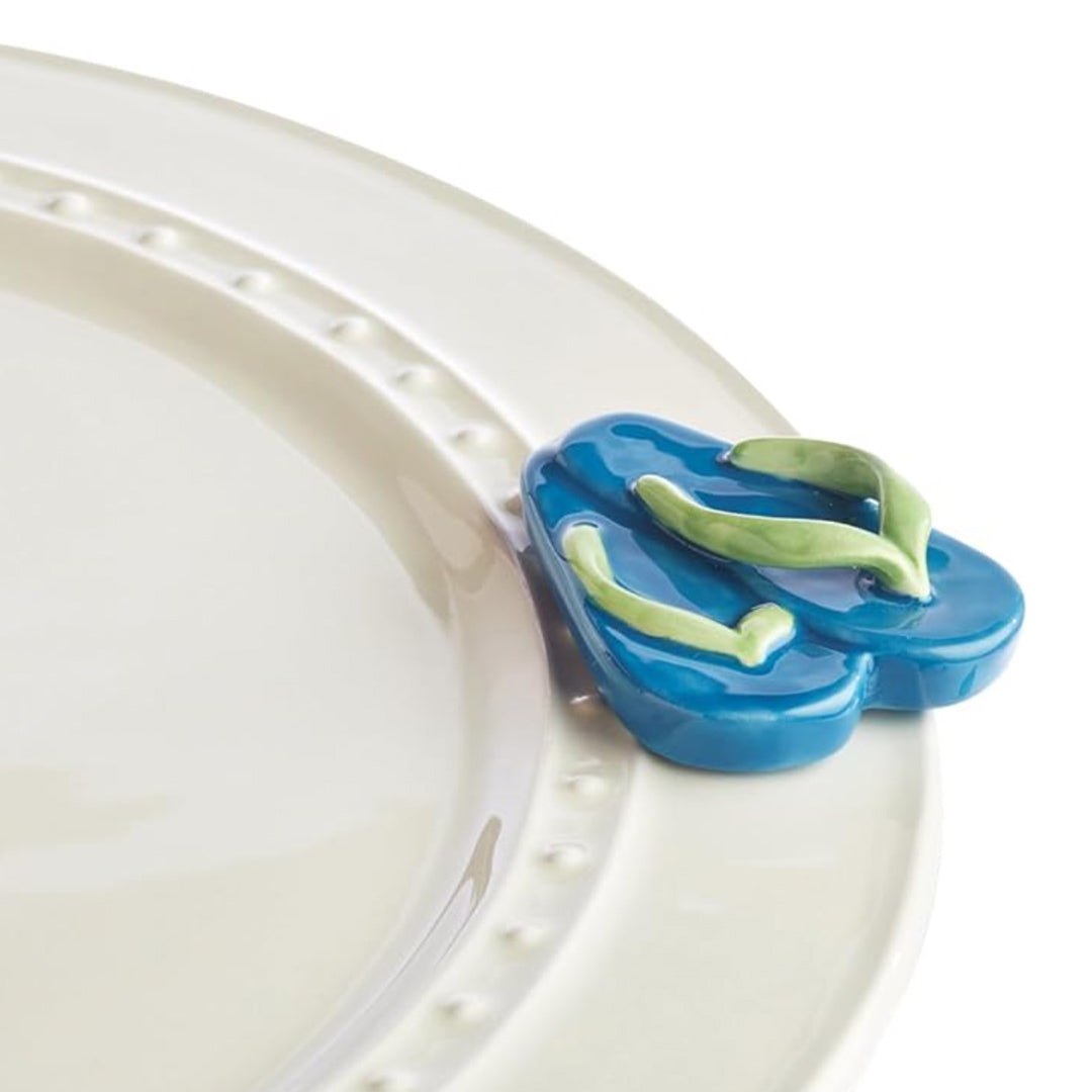 Nora Fleming Flip Flops Mini on the plate