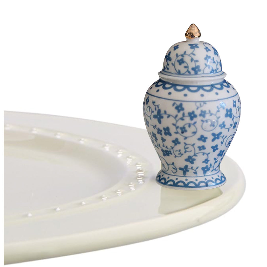 nora fleming ginger jar on the plate