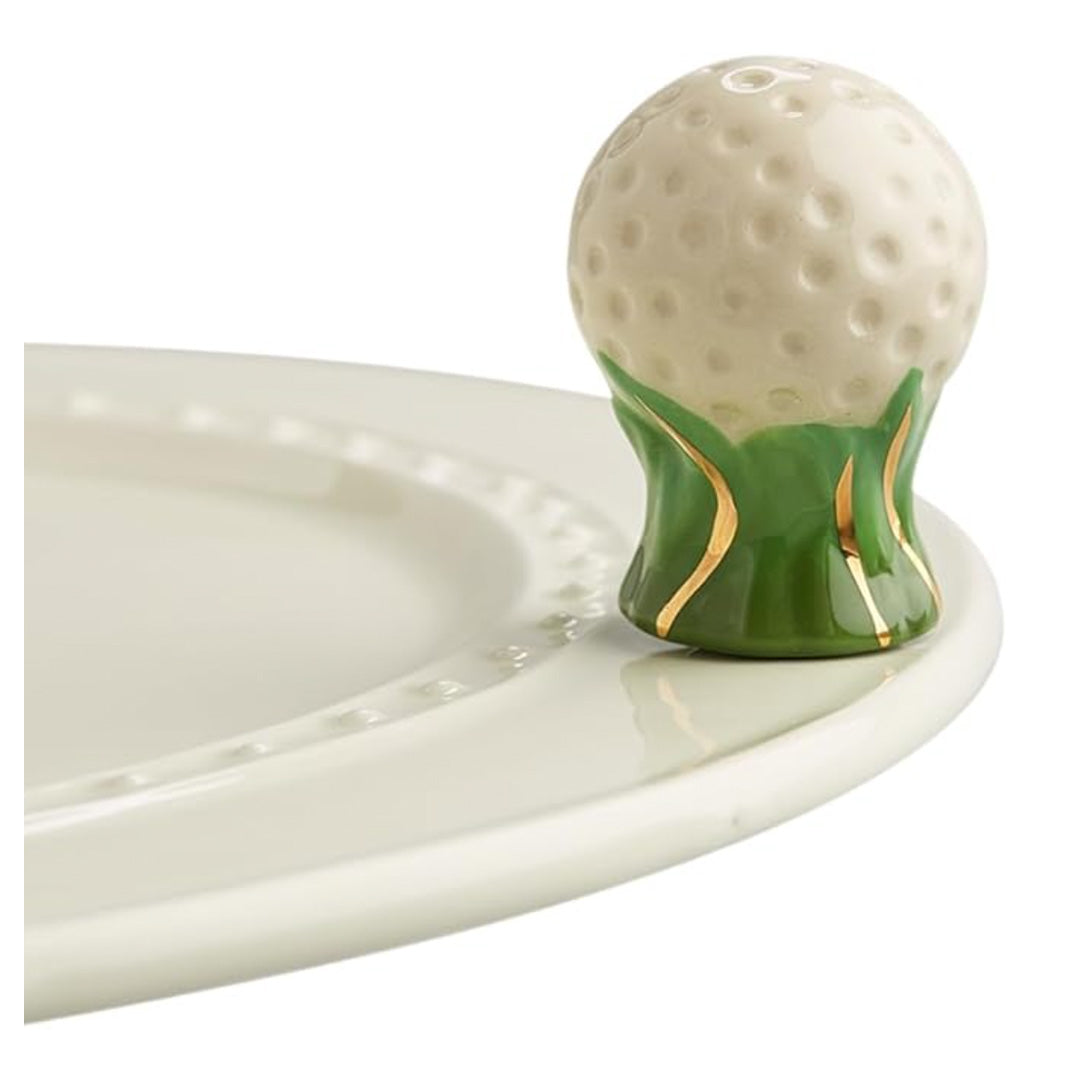 nora fleming golf ball on the plate