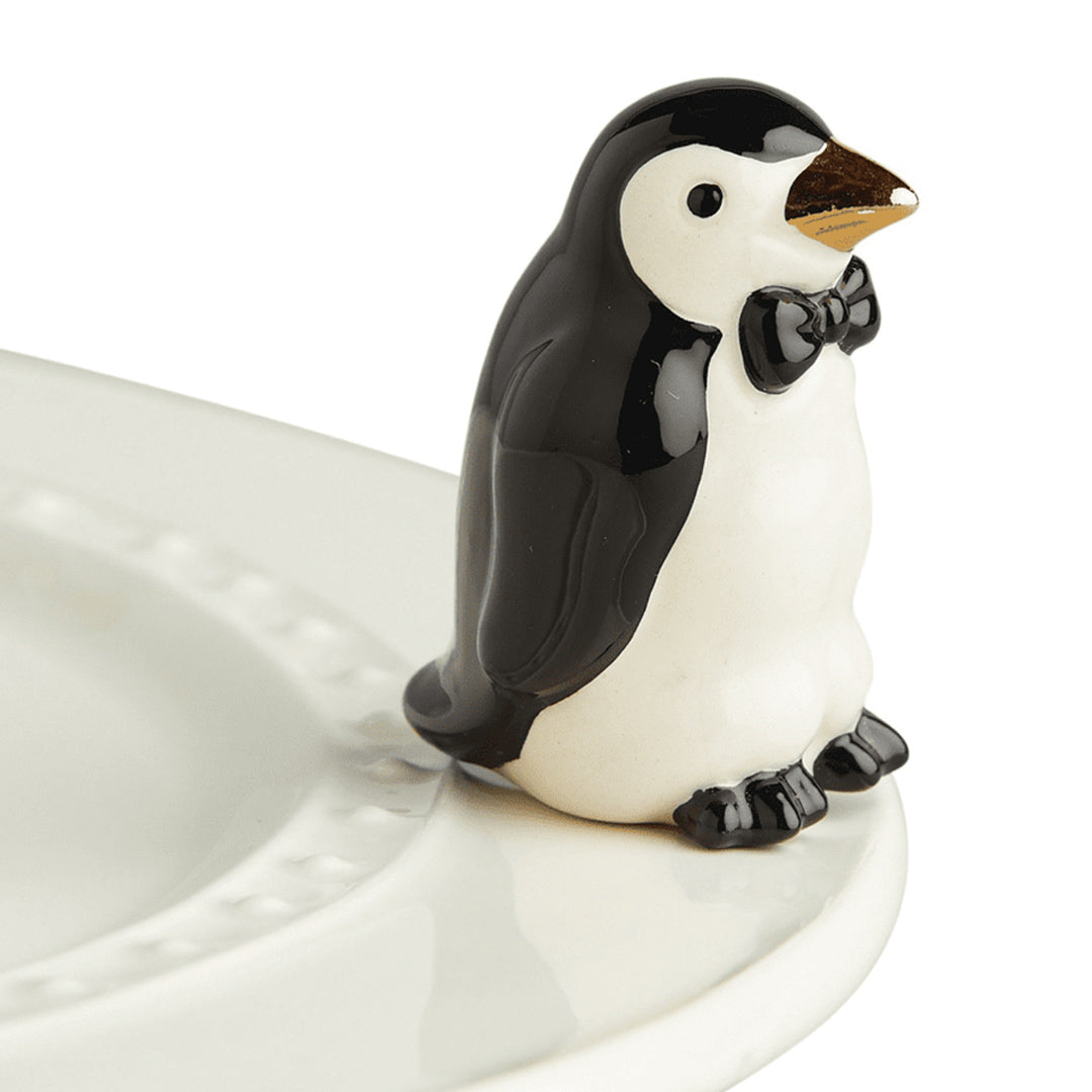 Nora Fleming Penguin Mini on the plate