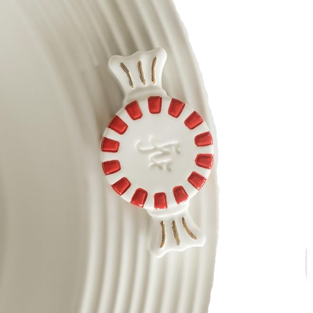 Nora Fleming Peppermint Mini on the plate