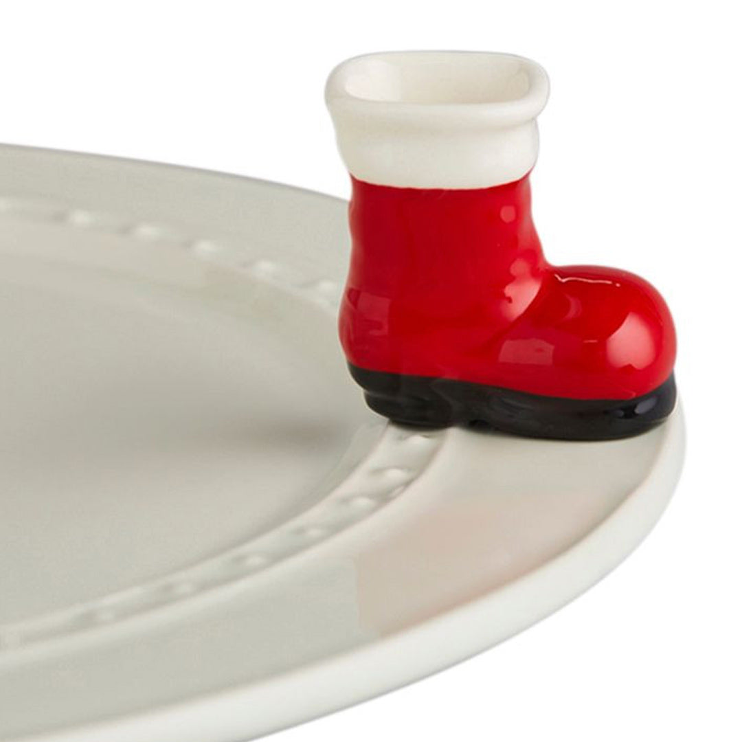 Nora Fleming Santa Boot Mini on the plate