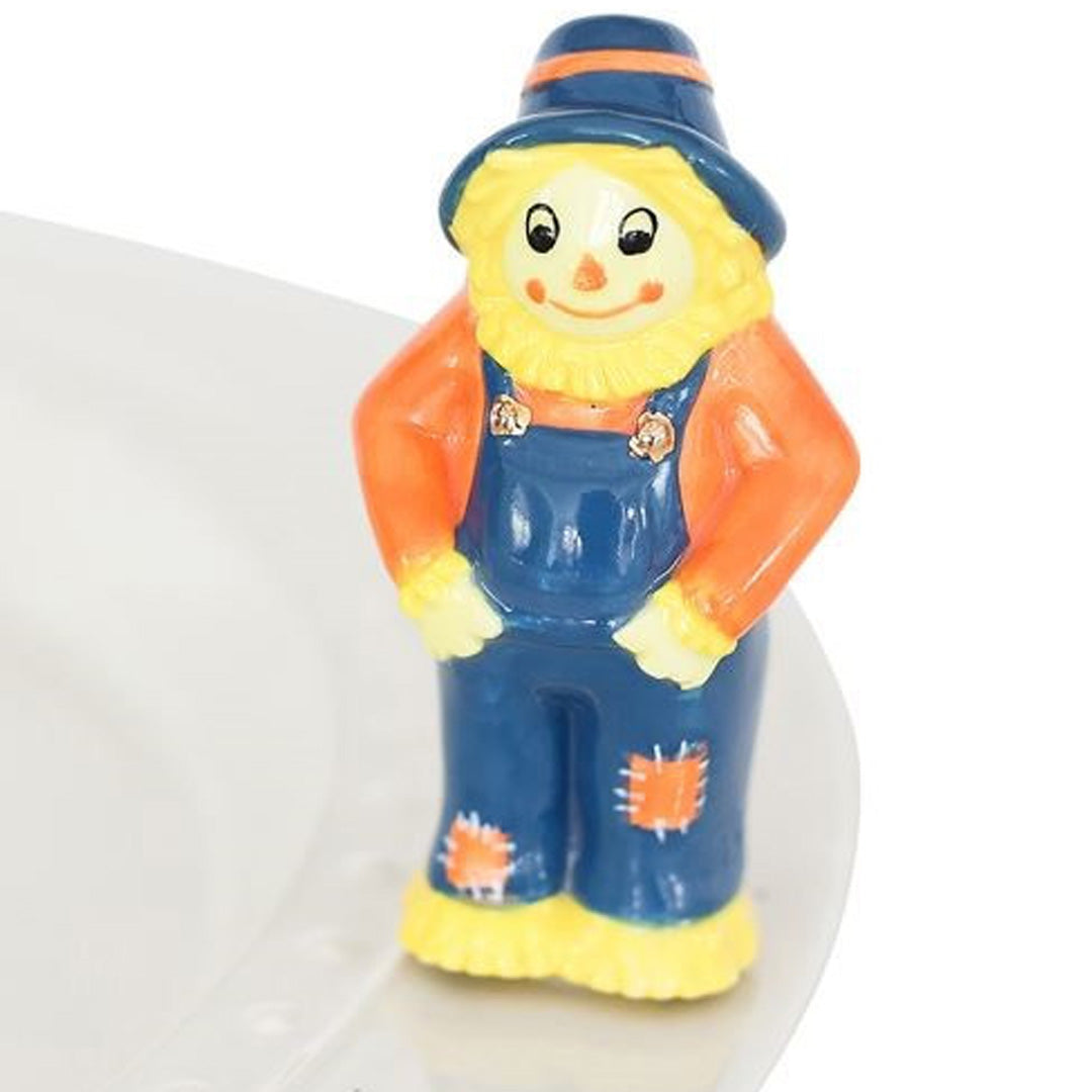 nora fleming scarecrow on the plate