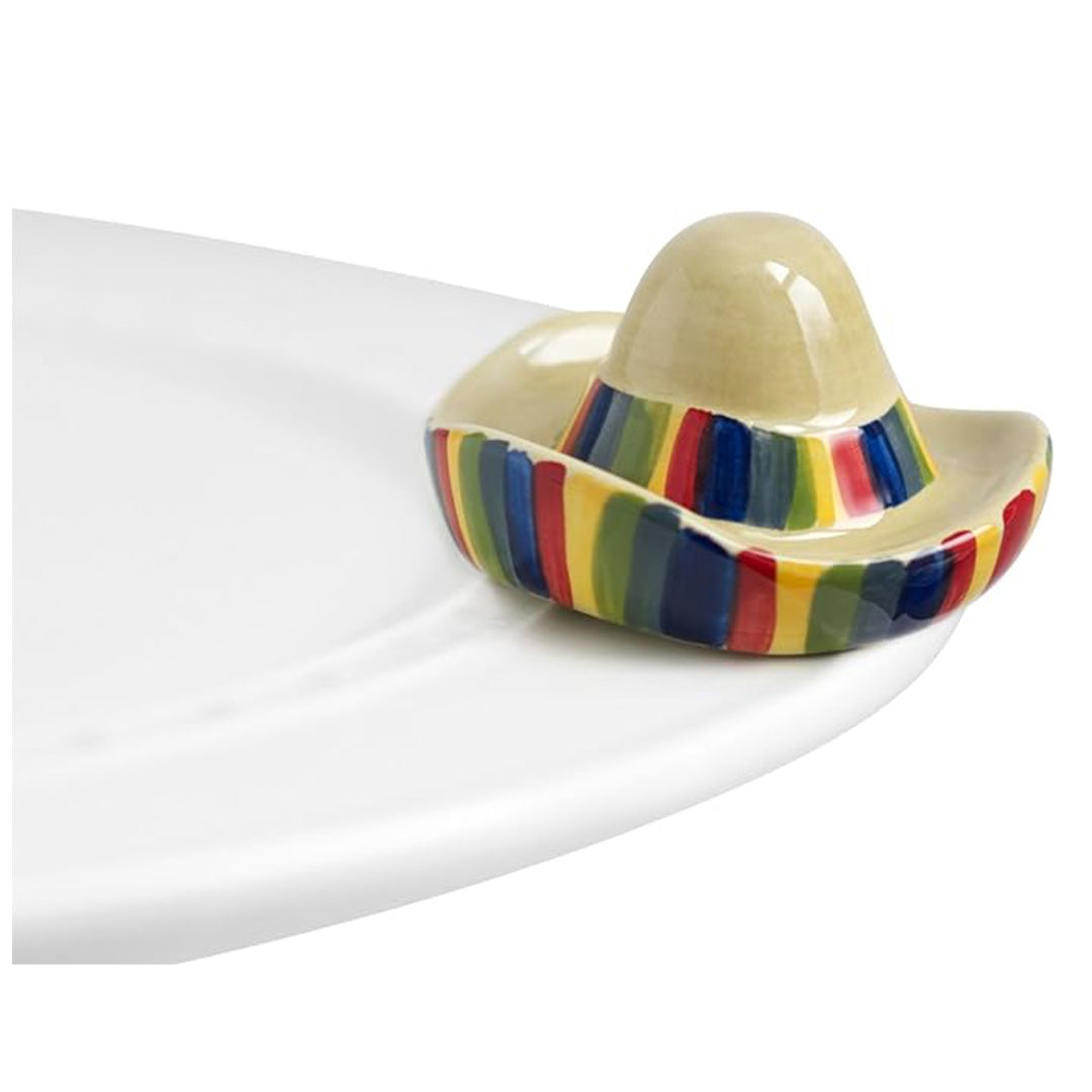 nora fleming sombrero on the plate