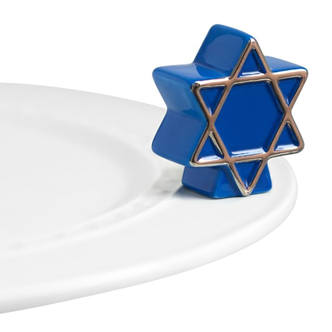 nora fleming blue star on the plate