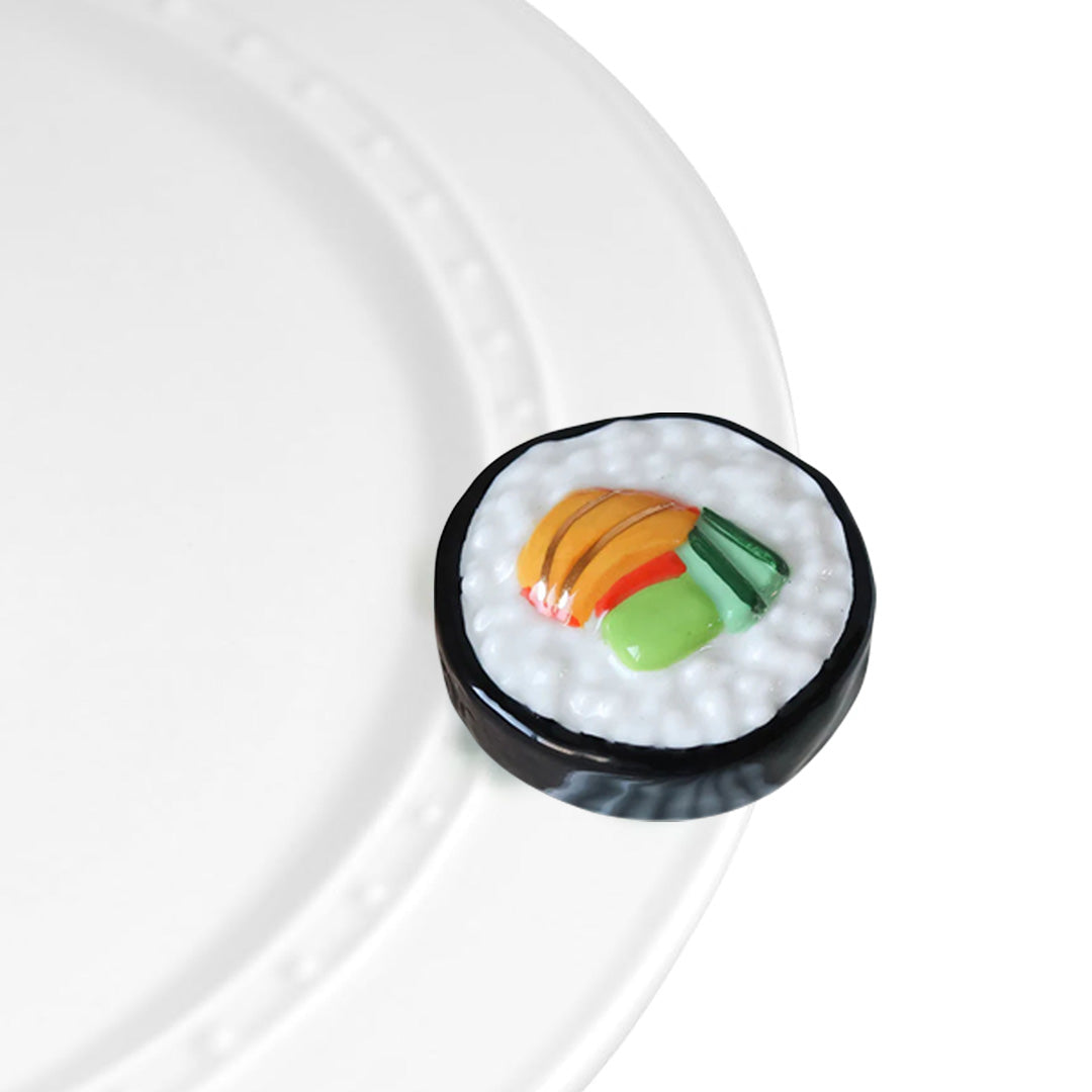 nora fleming sushi on the plate