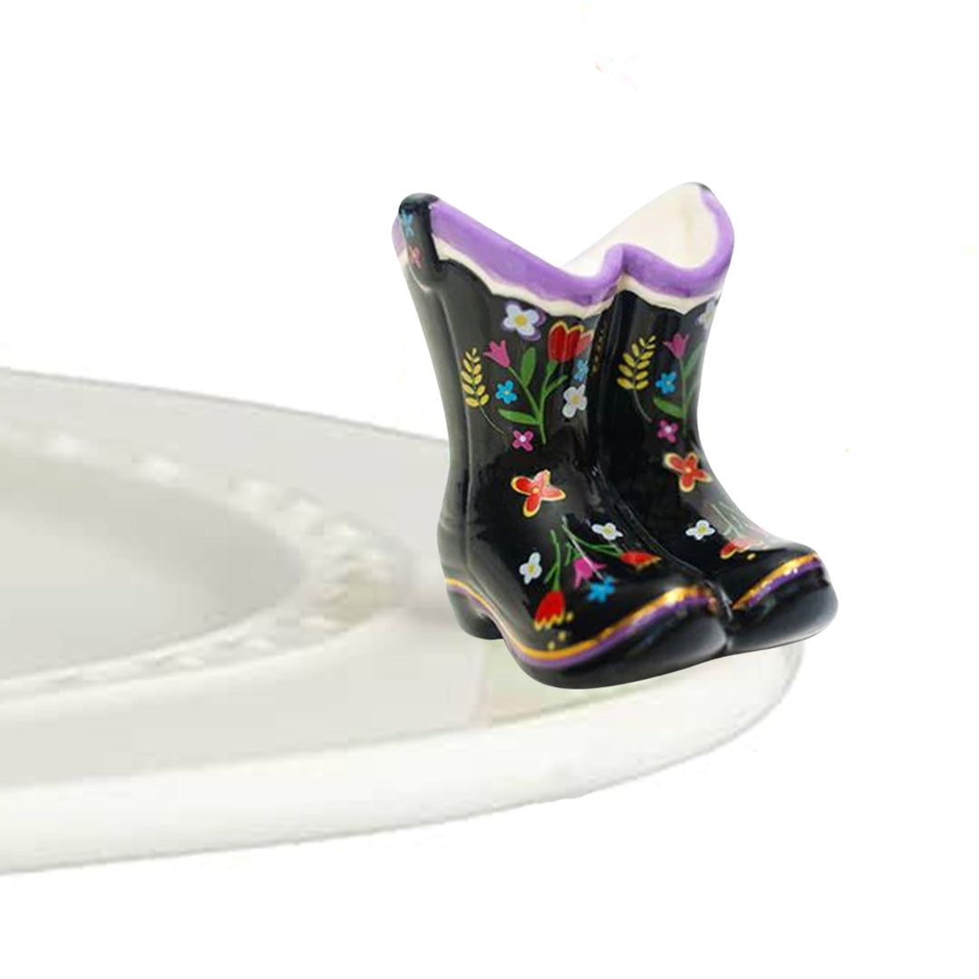 nora fleming western boots on the plate