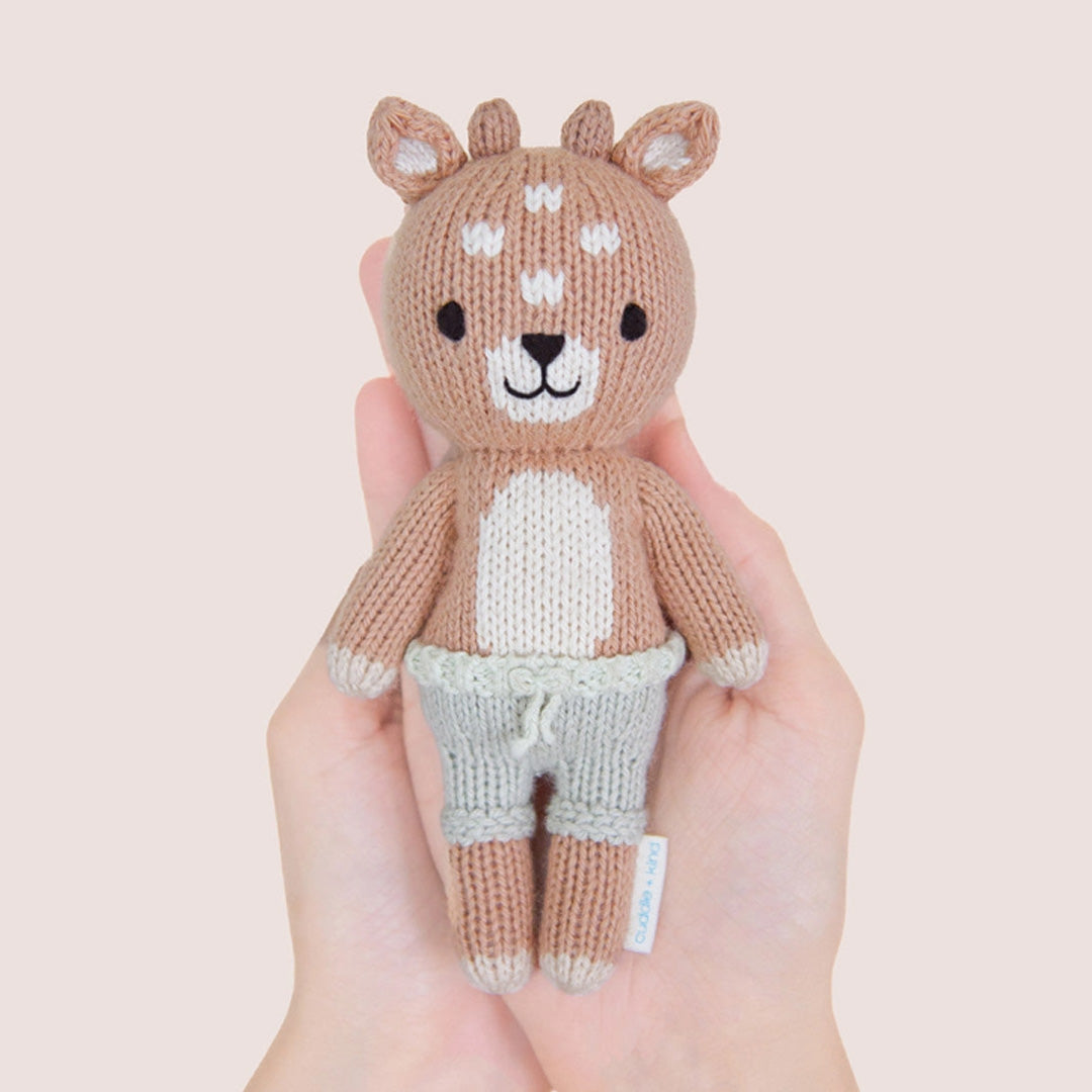 cuddle kind Tiny Elliott the Fawn
