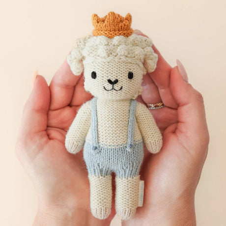 cuddle kind Tiny Sebastian the Lamb