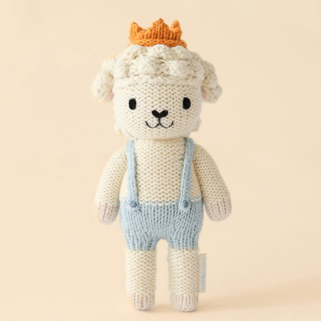 cuddle kind Tiny Sebastian the Lamb