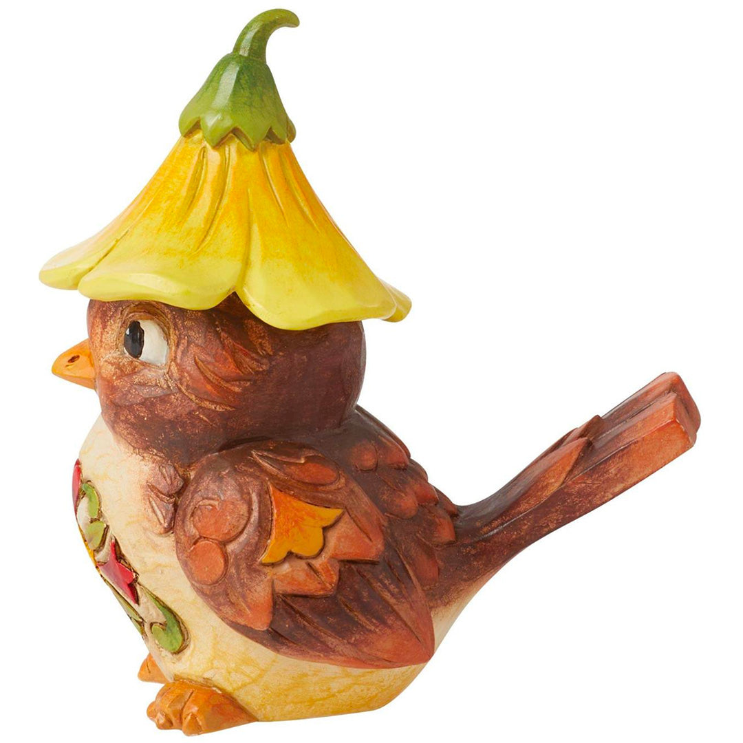 Jim Shore Bird with Flower Hat Figurine side