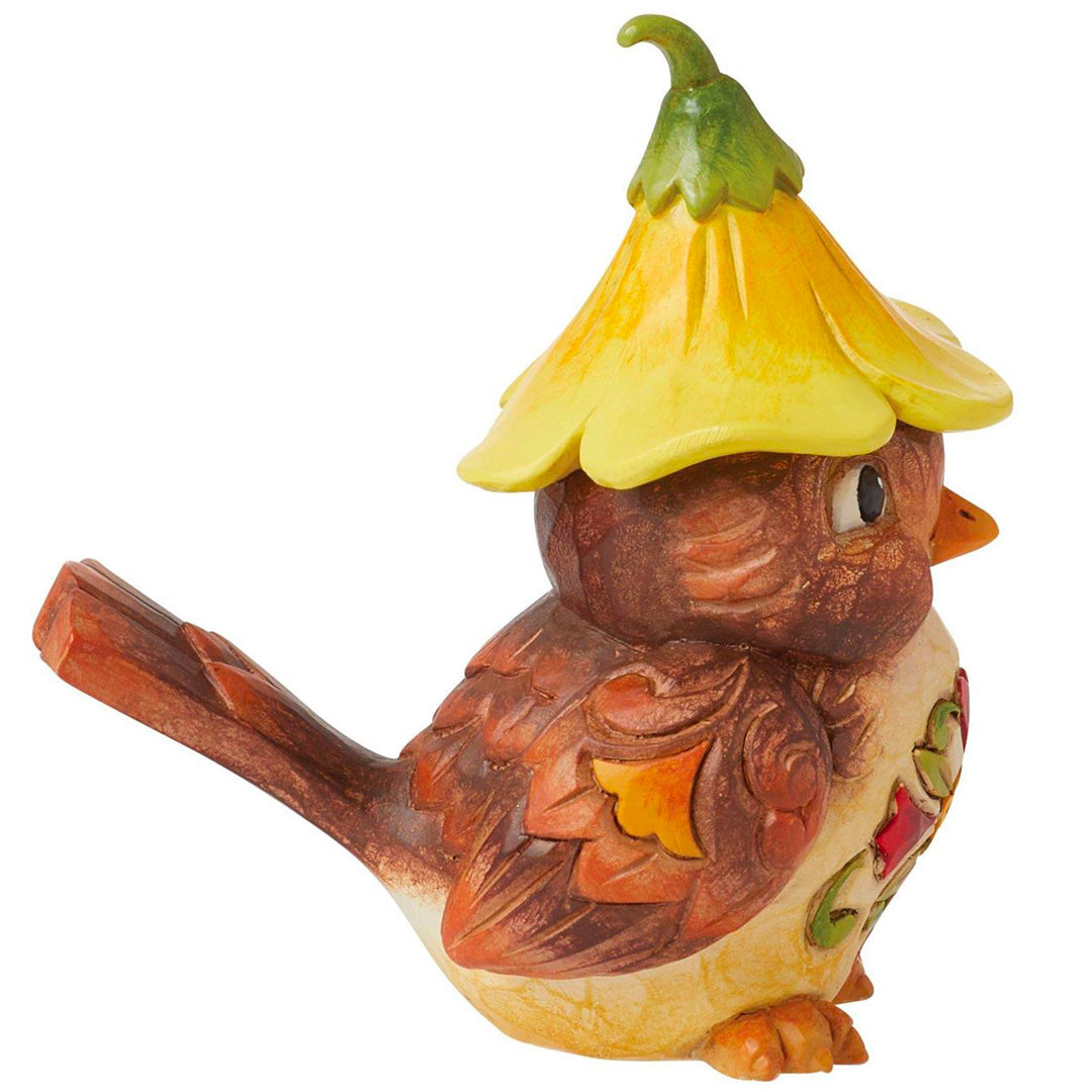 Jim Shore Bird with Flower Hat Figurine side