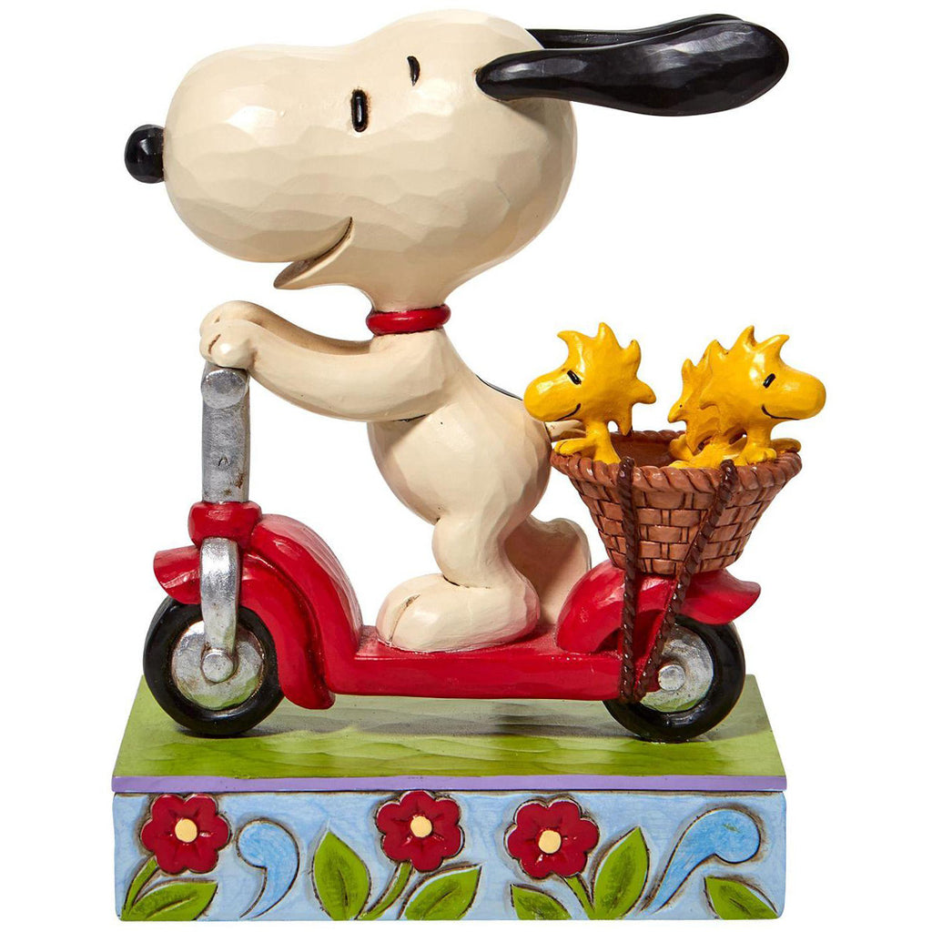 Jim Shore Snoopy Riding Scooter side left