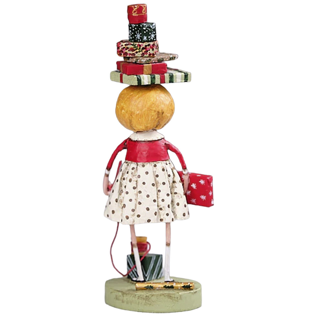 Wrappings and Ribbons Christmas Figurine Collectible by Lori Mitchell back