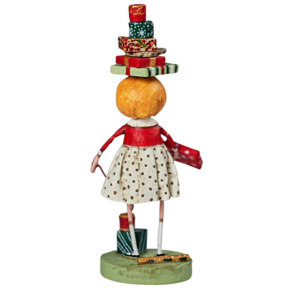 Wrappings and Ribbons Christmas Figurine Collectible by Lori Mitchell back