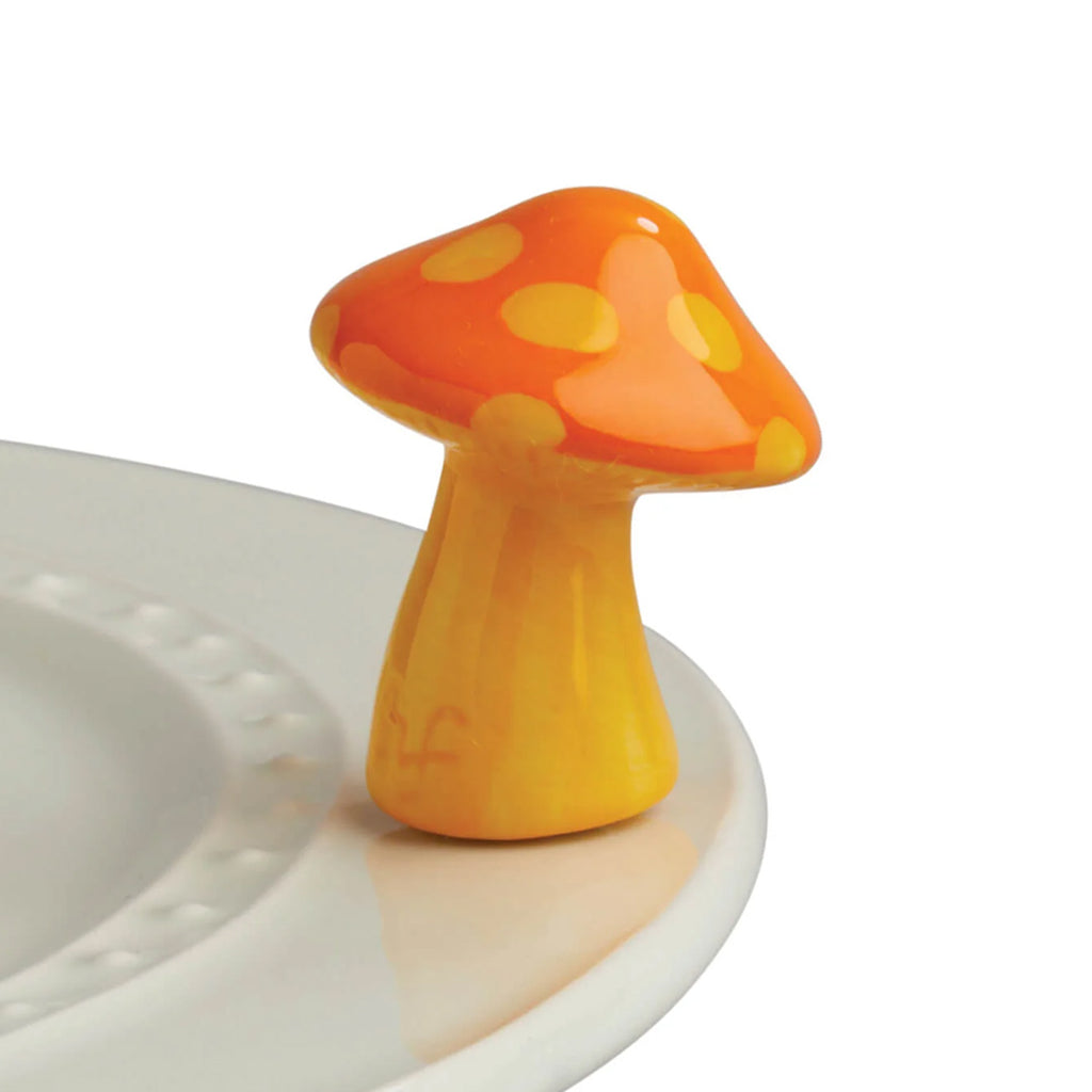 Nora Fleming Mushroom Mini on the plate