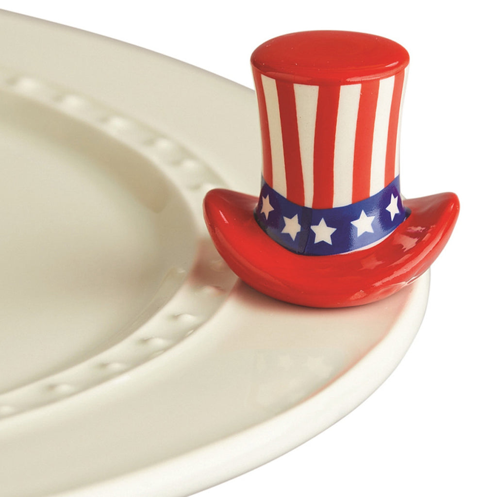 Nora Fleming Uncle Sam Hat Mini on the plate