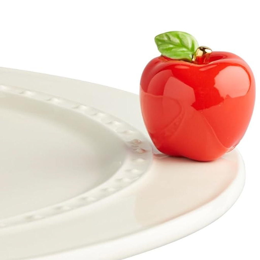 Nora Fleming Apple Mini on the plate