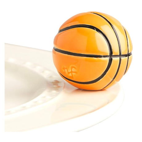 nora fleming basketball on the plate