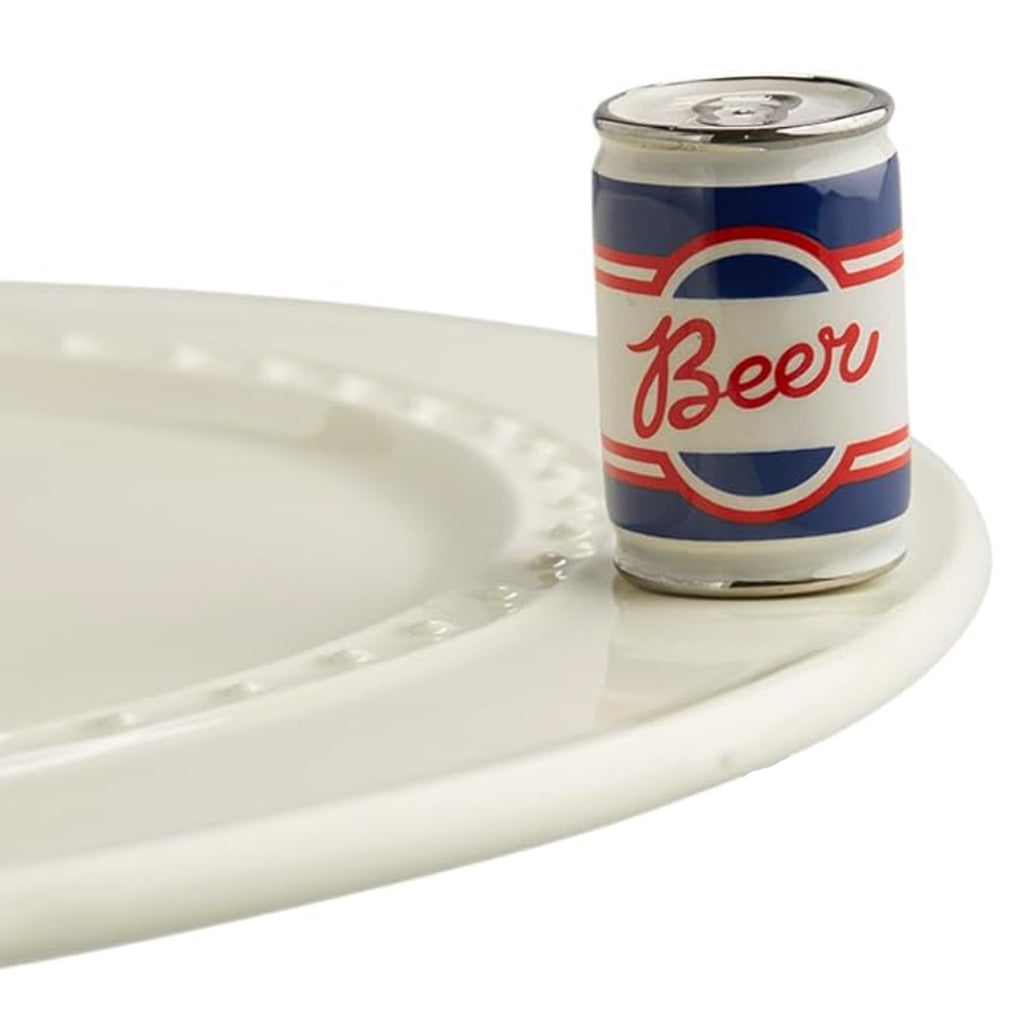 Nora Fleming Beer Can Mini on the plate