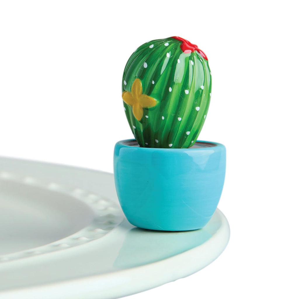 Nora Fleming Cactus Mini on the plate