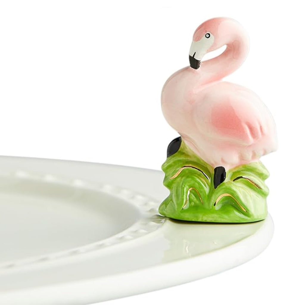 Nora Fleming Flamingo Mini on the plate