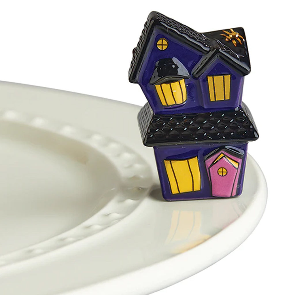 Nora Fleming Haunted House Mini on the plate