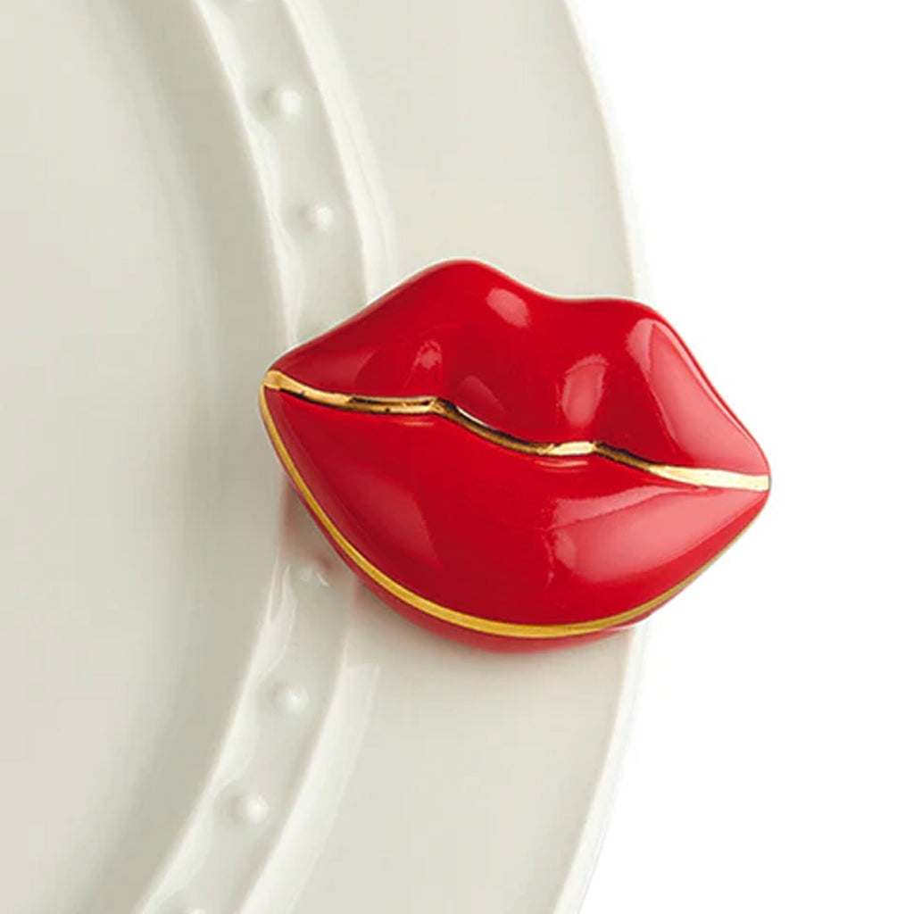 Nora Fleming Lips Mini on the plate