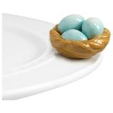 nora fleming nest on the plate