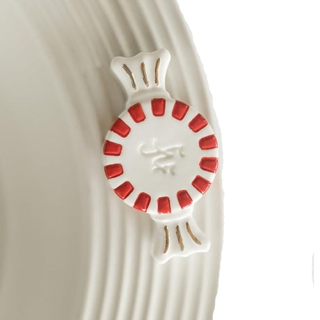 Nora Fleming Peppermint Mini  on the plate