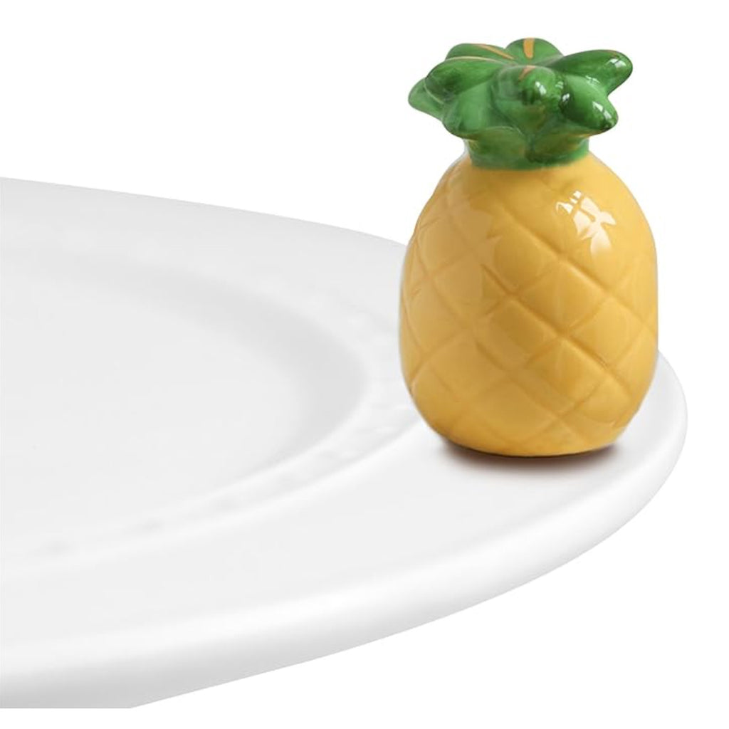 Nora Fleming Pineapple Mini on the plate