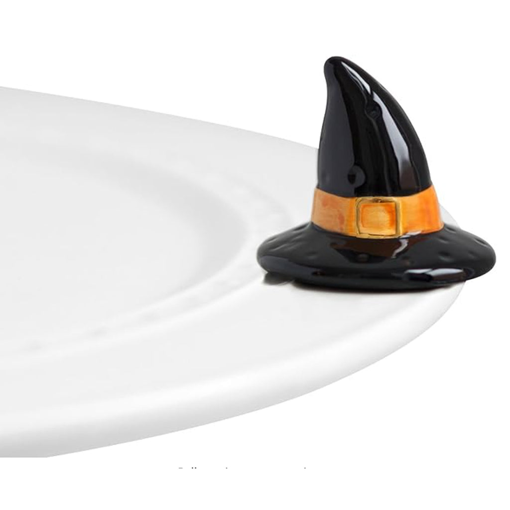 Nora Fleming Witch Hat Mini on the plate