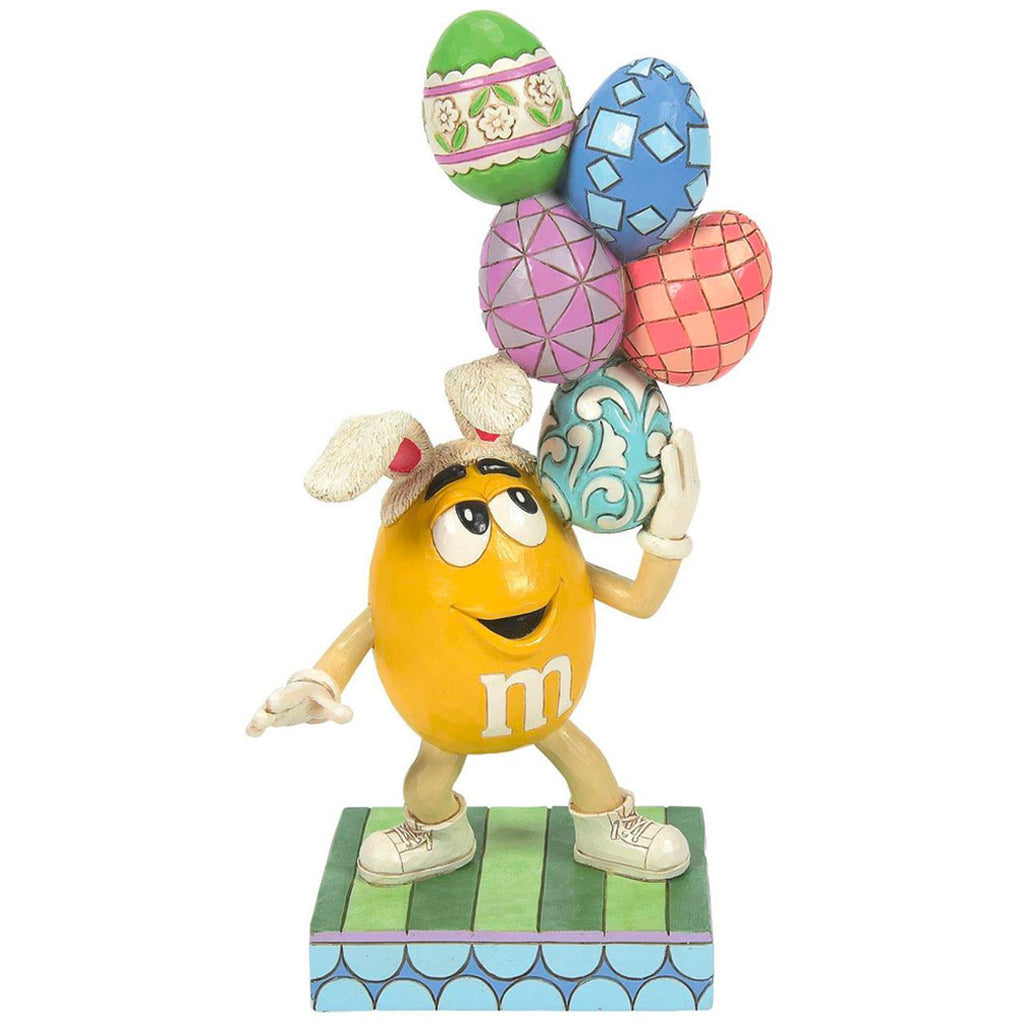 Jim Shore M&M'S Yellow Character with Eggs 8.35" front