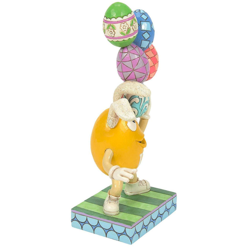 Jim Shore M&M'S Yellow Character with Eggs 8.35" side